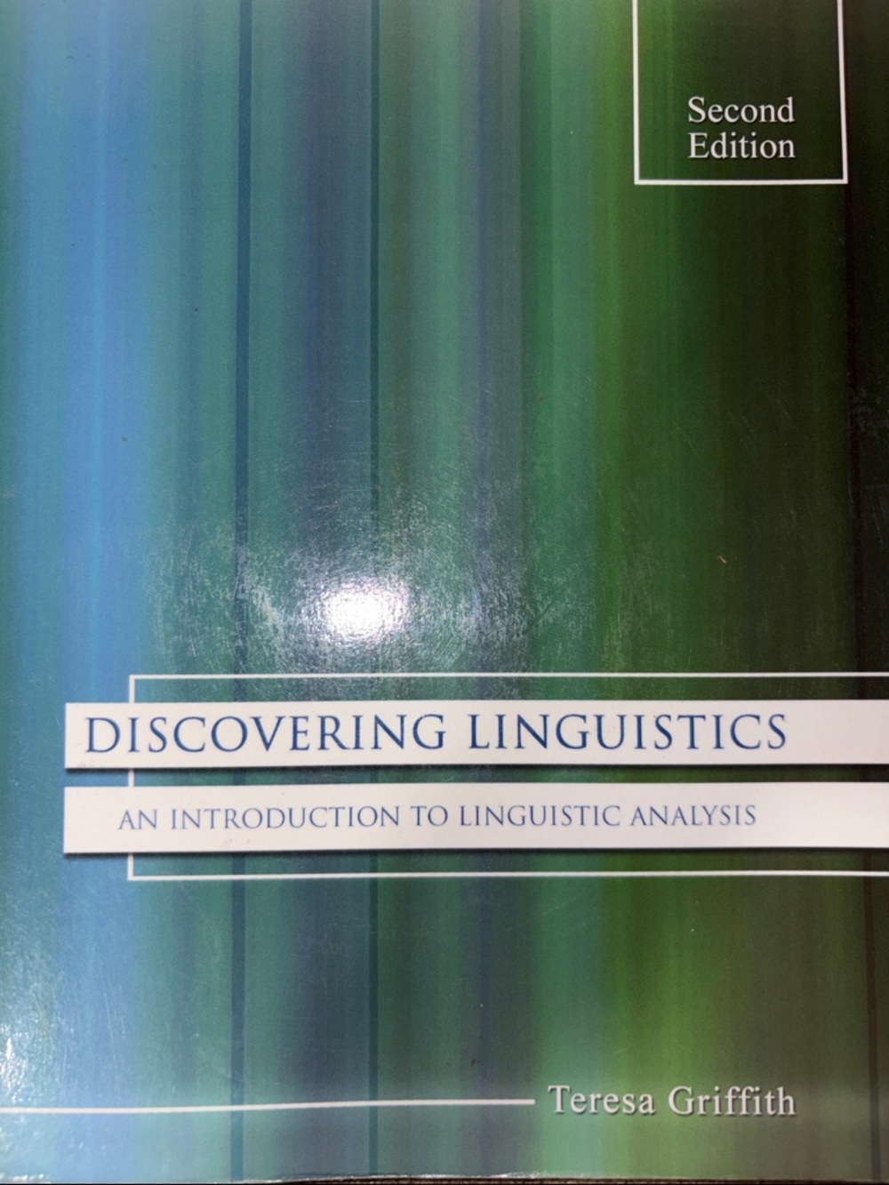Discovering Linguistics textbook - green and blue cover